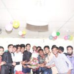 Imran Hossan Celebrating Success With his Coworkers and Boss.